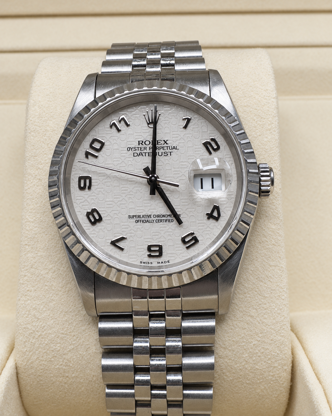 Front view of the Rolex Datejust 16220 with white Jubilee computer dial inside its presentation box.